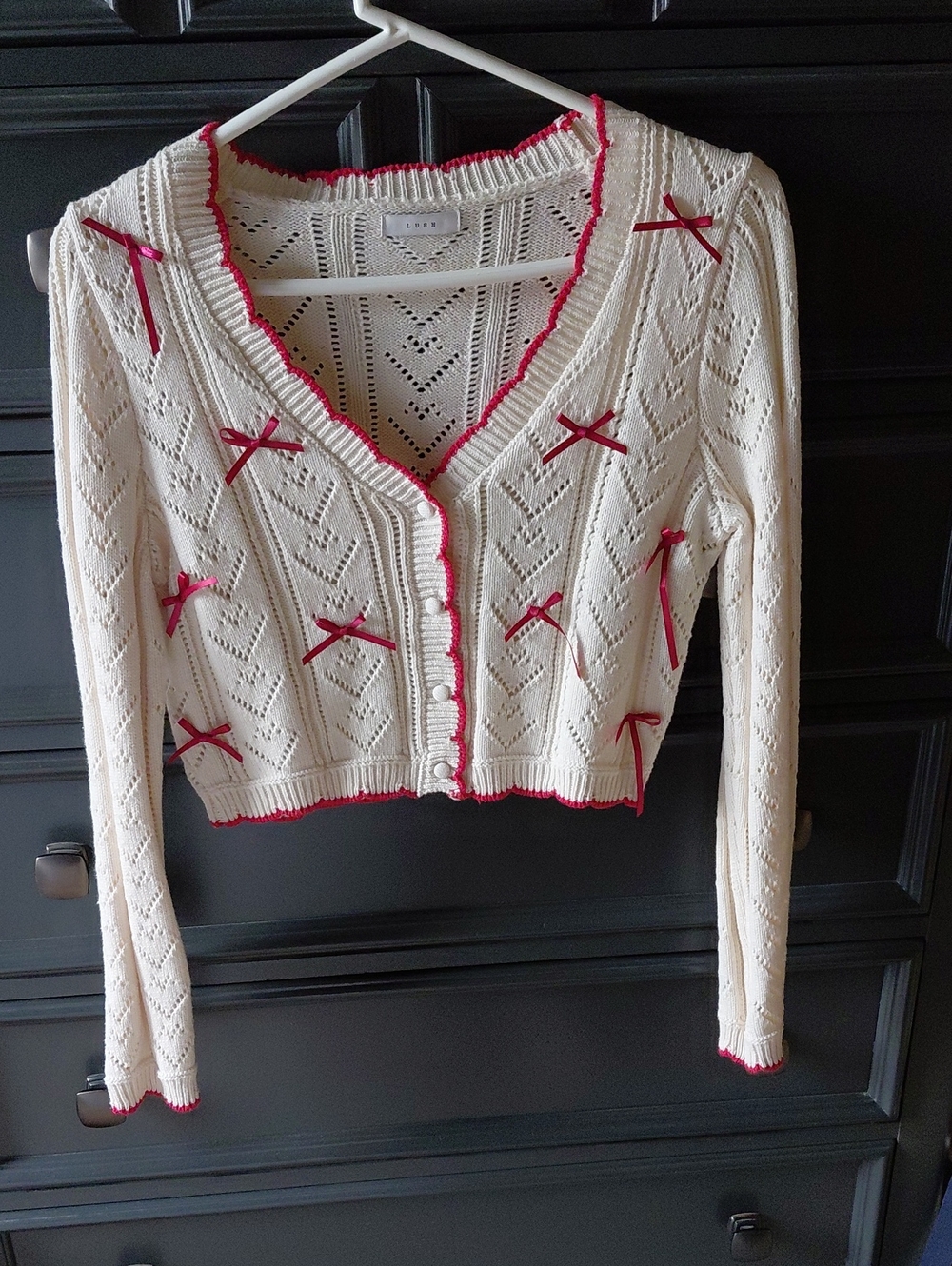 LUSH Cream Knit Cropped Cardigan with Red Trim and Bows